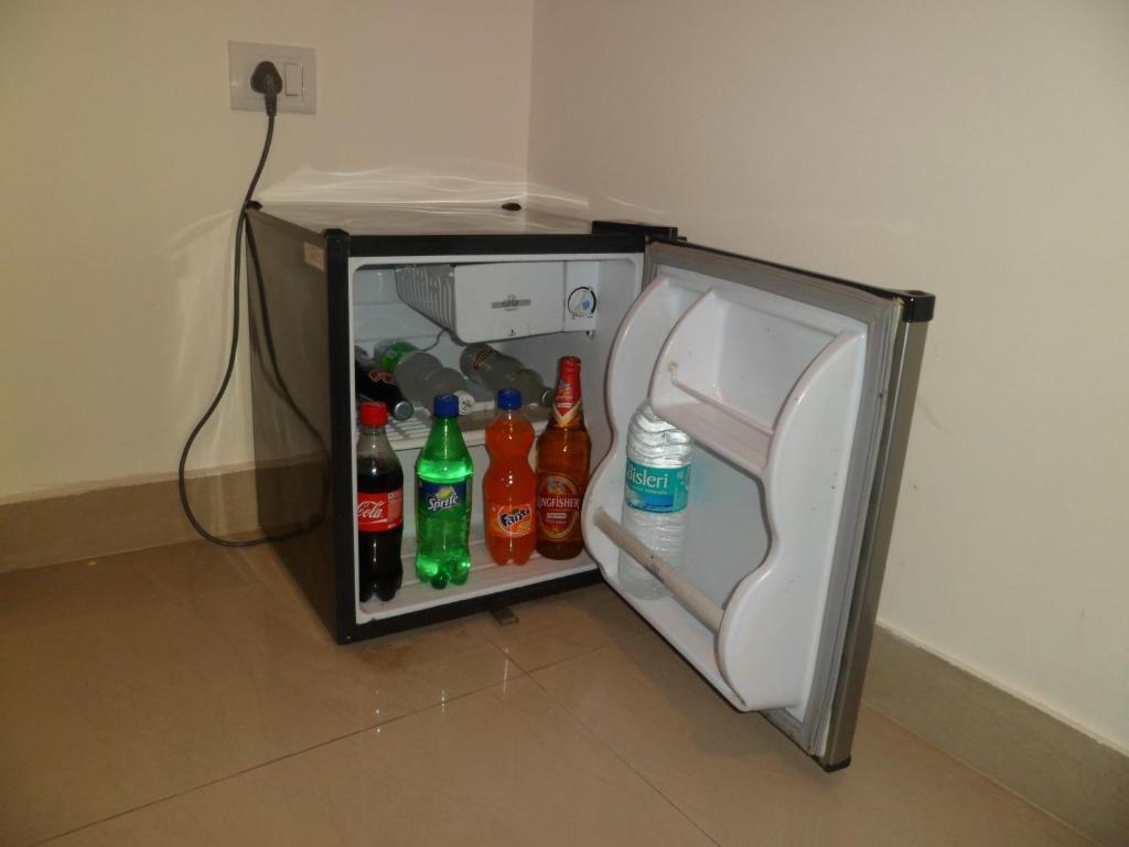 Hotel Arjun  Nueva Delhi Habitación foto
